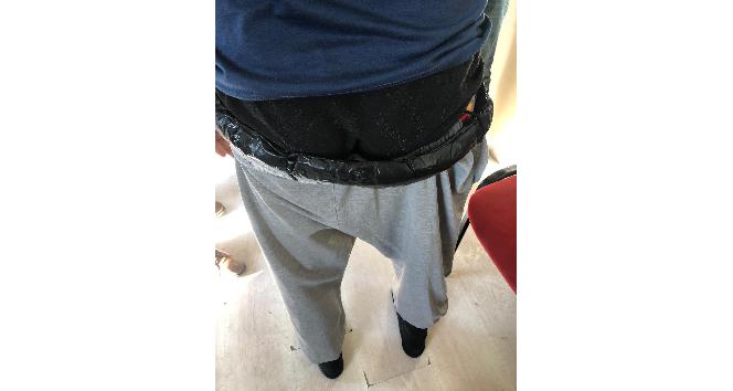 Beline poşetle sardığı uyuşturucuyla yakalandı