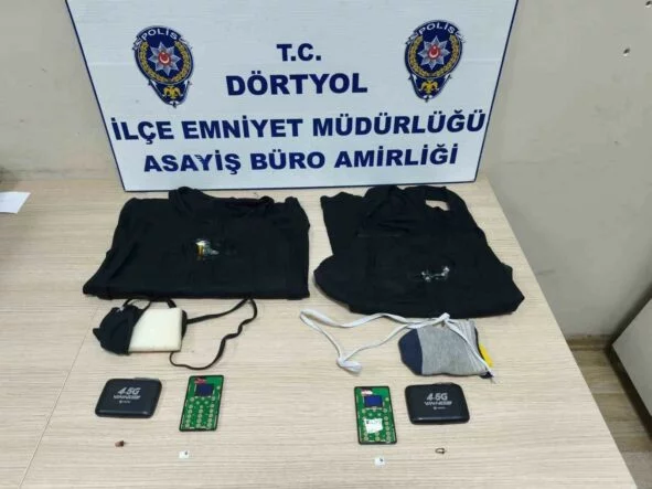 HATAY'DA EHLİYET SINAVINA KOPYA DÜZENEĞİ İLE GİREN İKİ KARDEŞ YAKALANDI